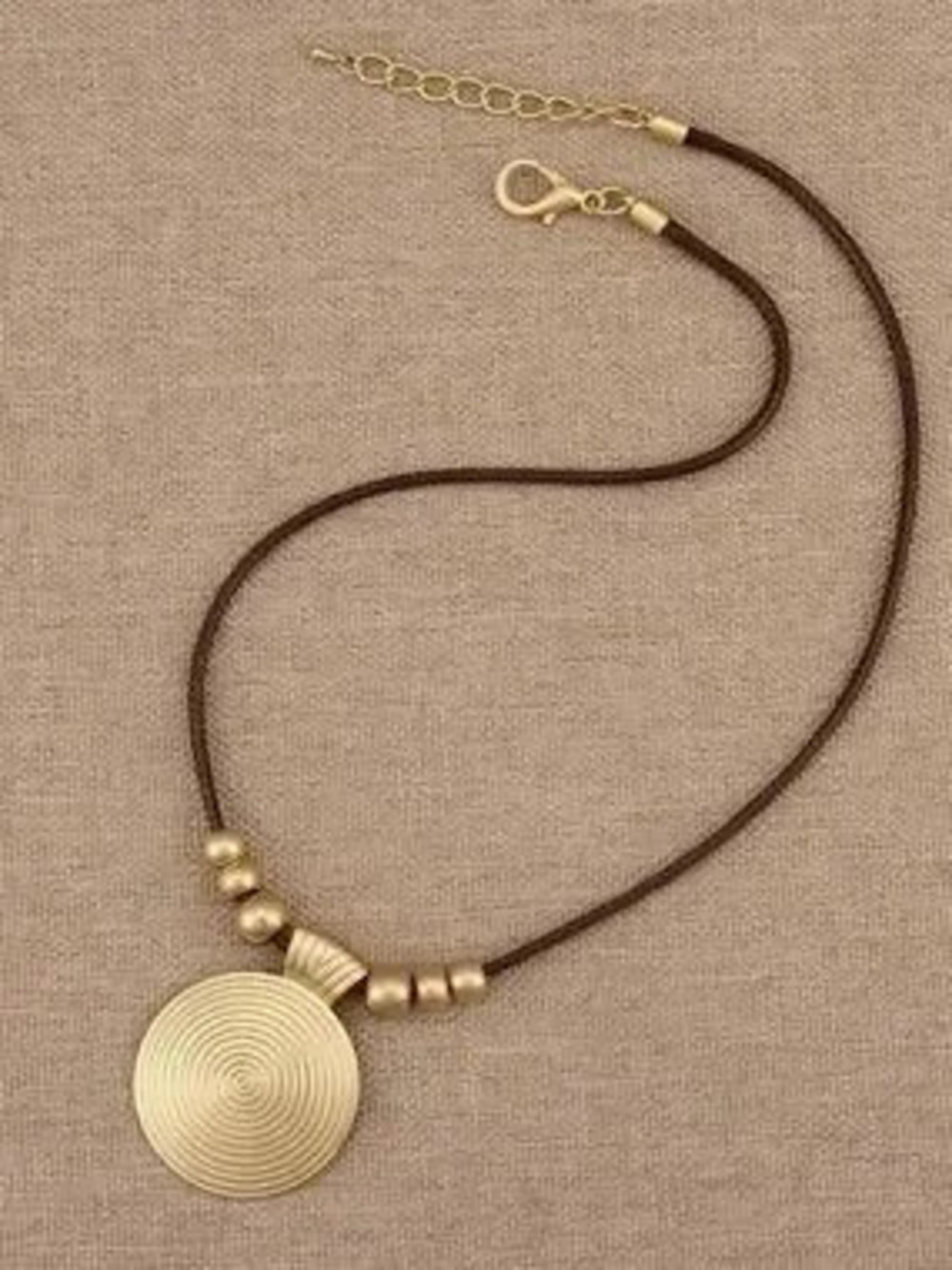 Anthropologie Gold-Tone Concentric Disc Necklace with Brown Cord